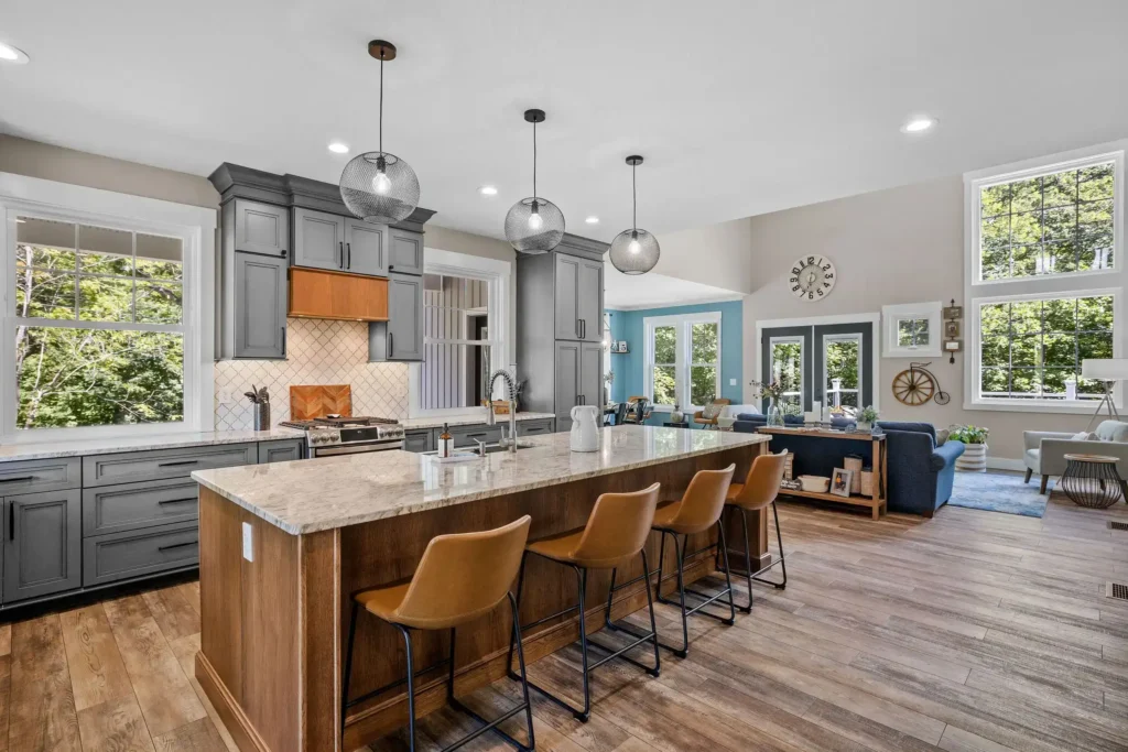 A beautiful modern kitchen simple color tones with large countertop.